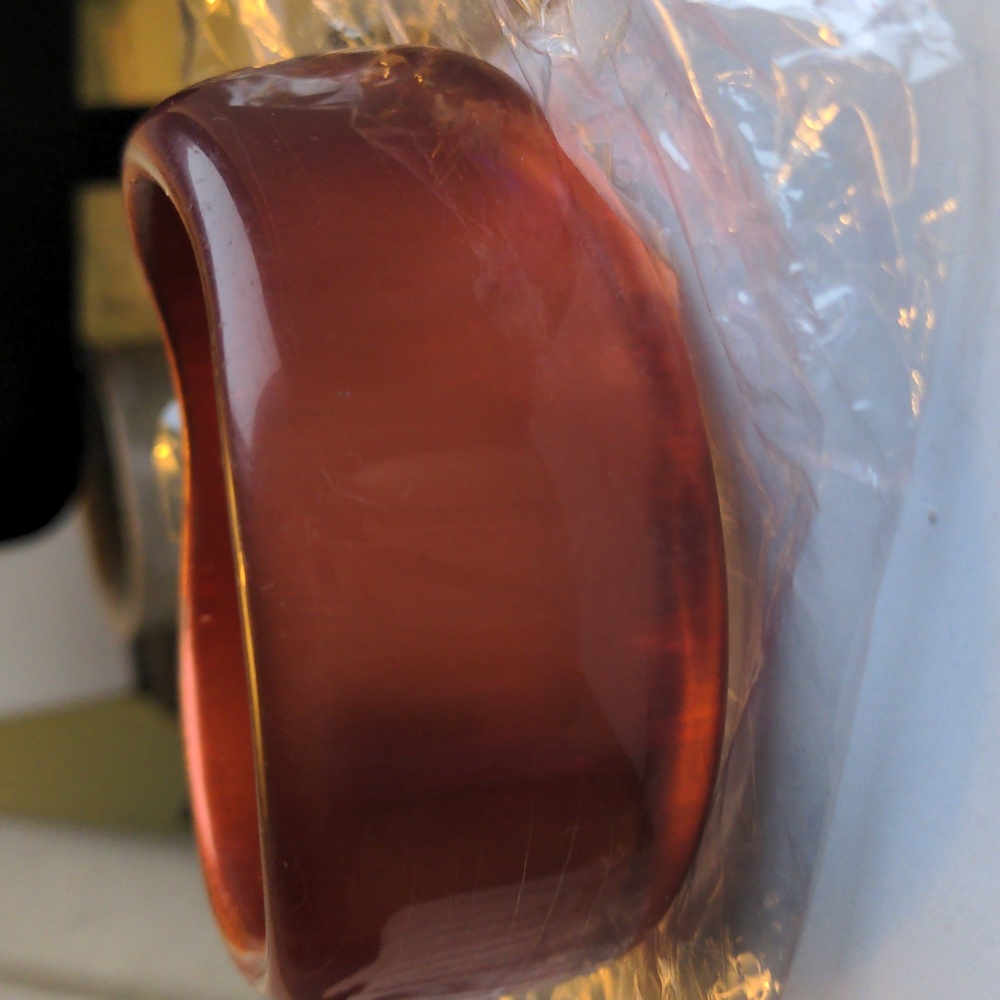NWT Macy's Resin Bangle.  1+ inch wide, 3" inside.  Coppery gold.  lightweight.